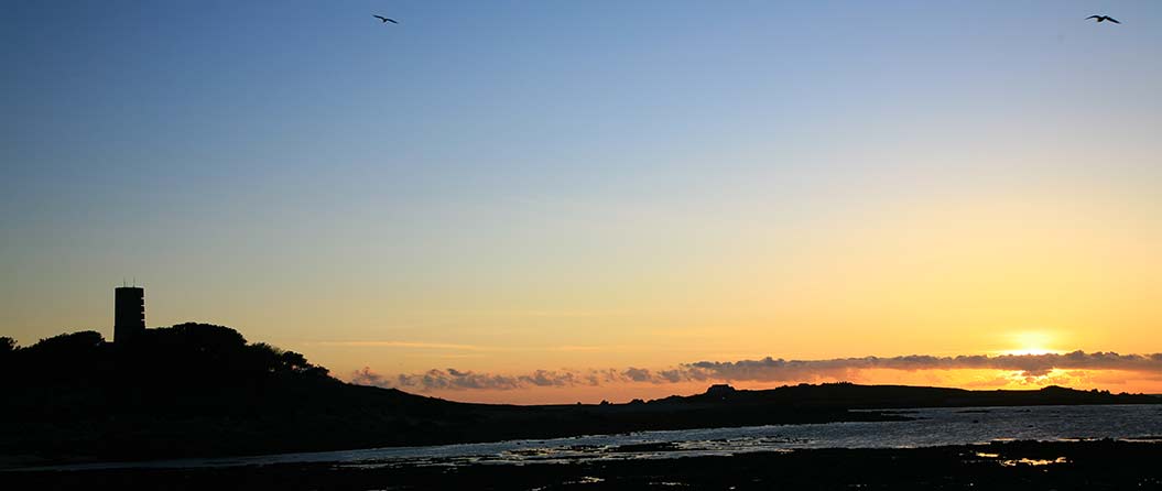 Sunset on Guernsey holidays, Sherpa walking holidays