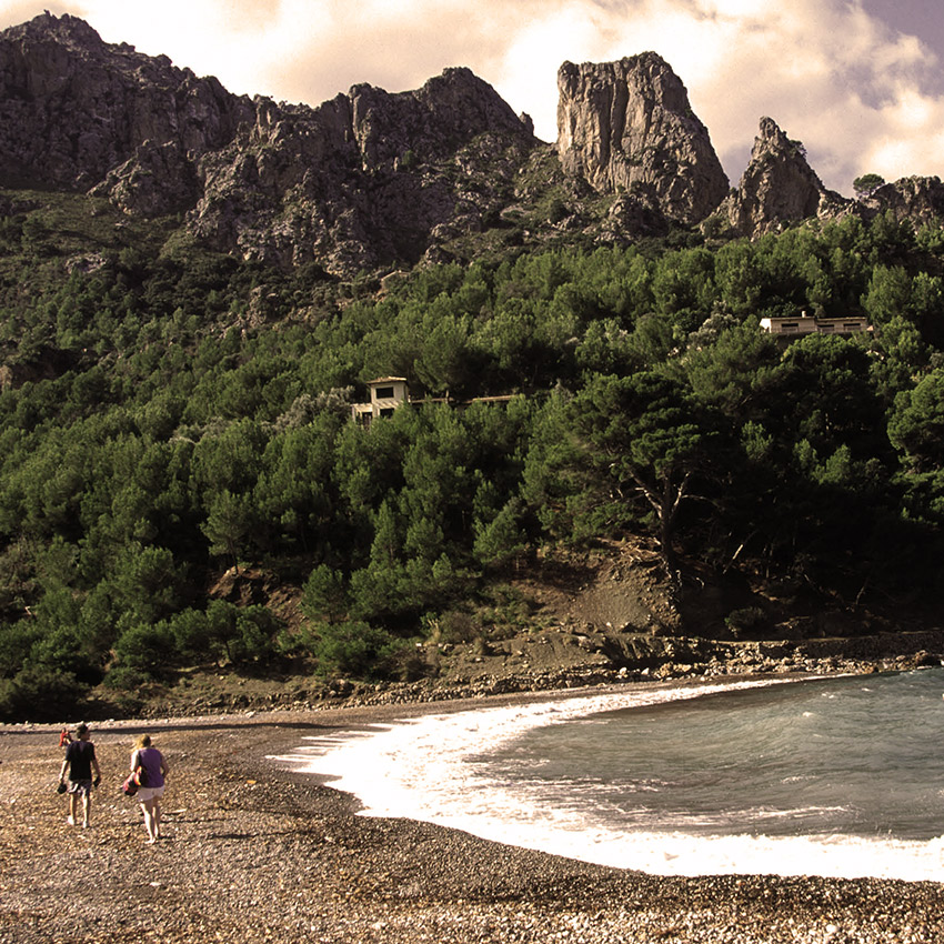 Walking in Majorca on the beach in Cala Tuent